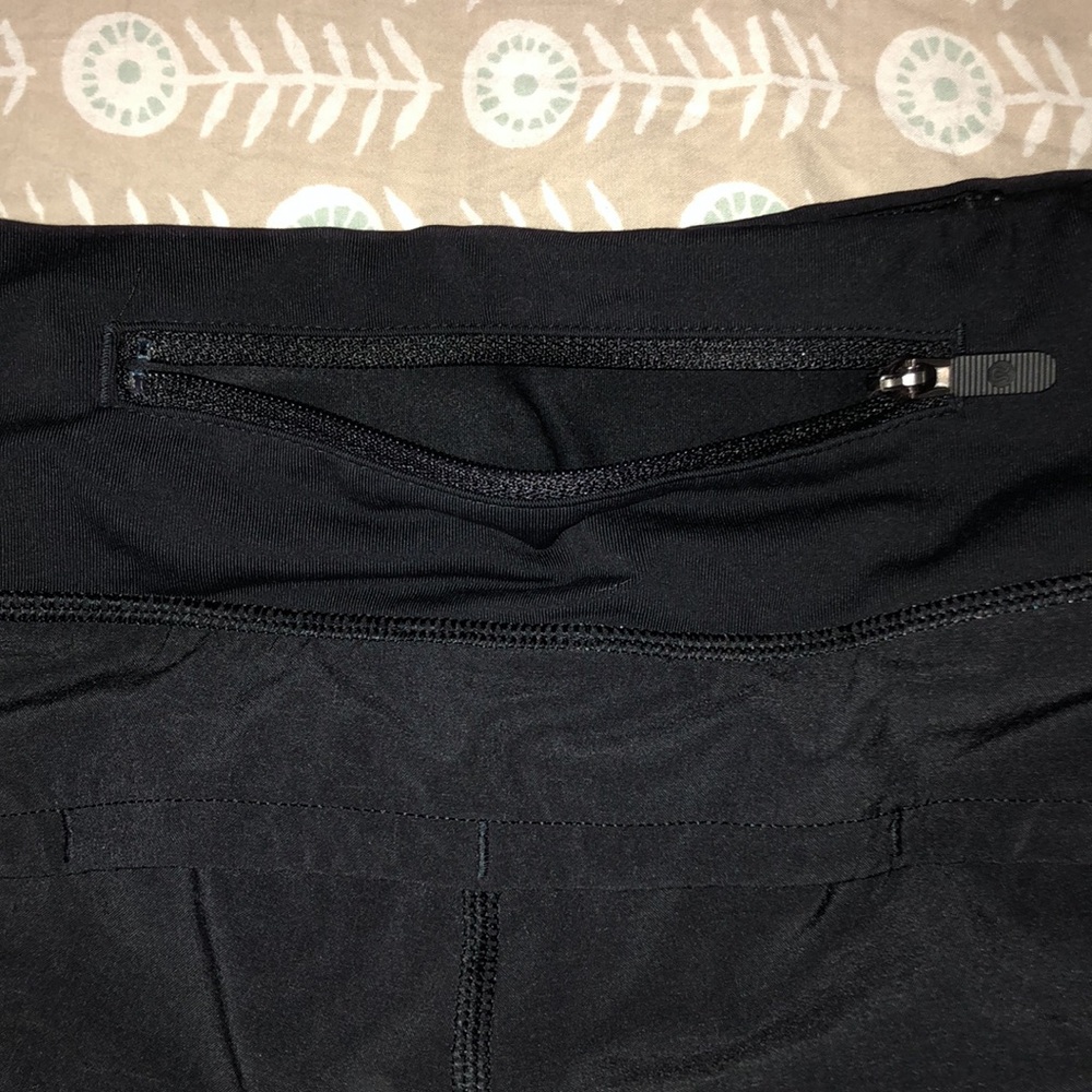 Two pairs of black Lulu Lemon shorts, size medium. - Picture 9 of 9